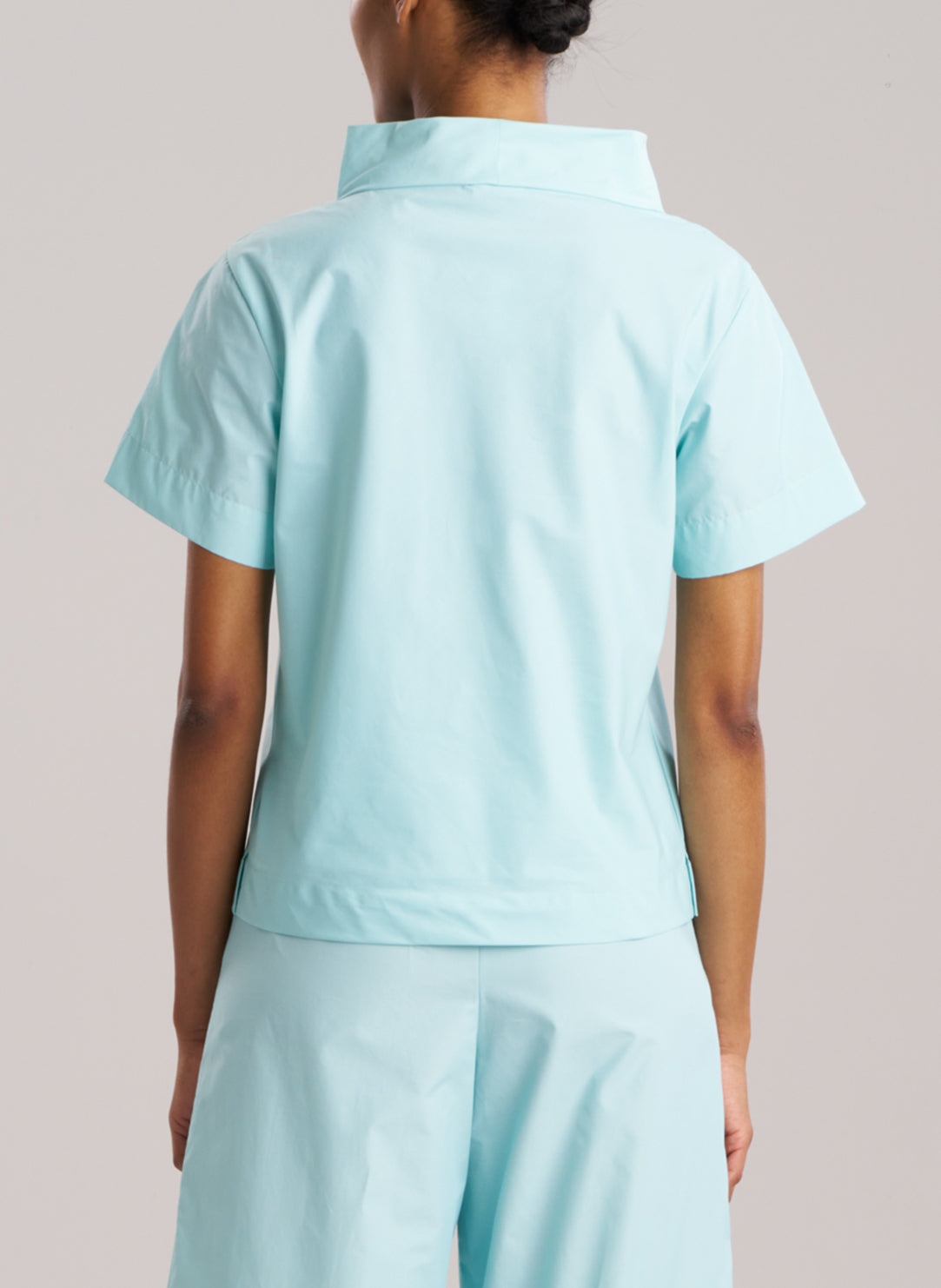 Techno Poplin Light Blue Short Sleeve Funnel Neck Top